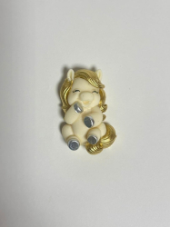 Изображение Фигурка из глазури Лошадка на спинке