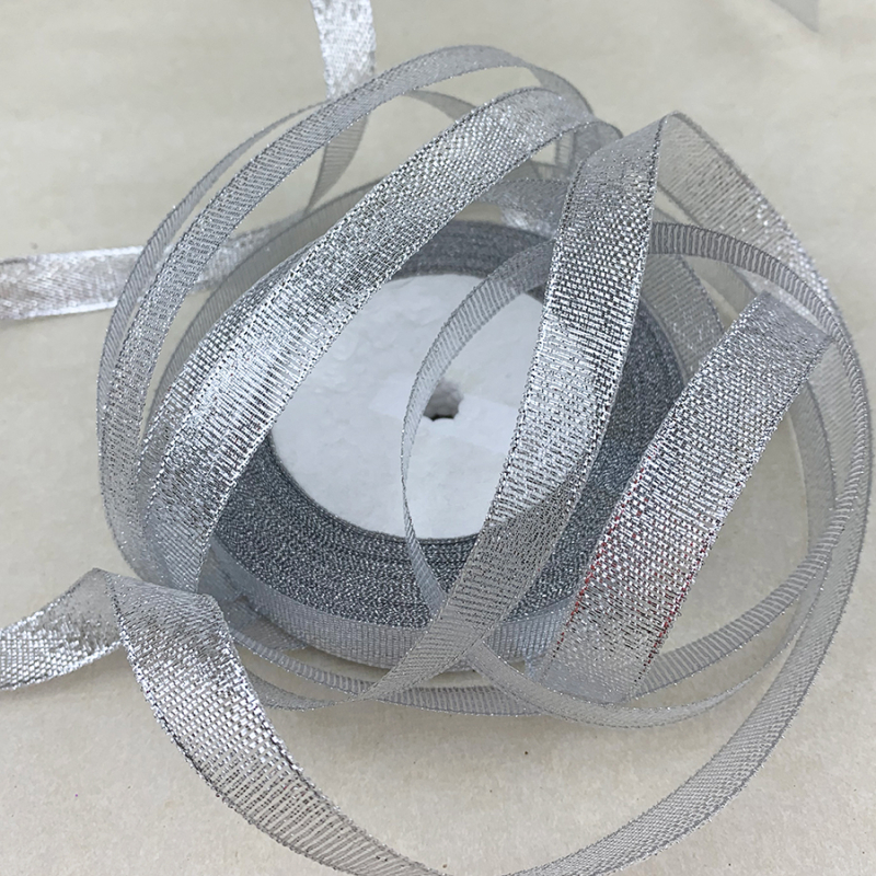 Лента парчовая 15 мм (22 метра, цвет СЕРЕБРО) Изображение Лента парчовая 15 мм (22 метра, цвет СЕРЕБРО)